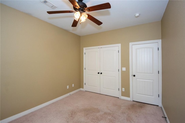3402 Crosswinds Blvd, Bentonville, AR 72713 - unfurnished bedroom with light colored carpet and a ceiling fan