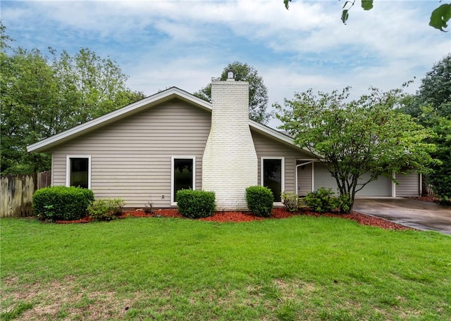 2176 Orchard Hill Rd, Siloam Springs, AR 72761 - view of front of home featuring concrete driveway, a chimney, and a garage