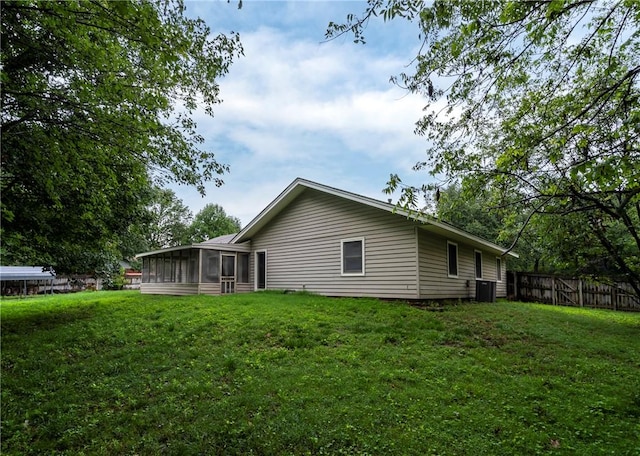 2176 Orchard Hill Rd, Siloam Springs, AR 72761 - view of home's exterior featuring a sunroom and a central AC unit