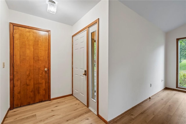 2176 Orchard Hill Rd, Siloam Springs, AR 72761 - foyer with light wood-style floors and lofted ceiling