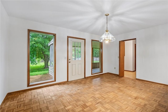 2176 Orchard Hill Rd, Siloam Springs, AR 72761 - empty room with baseboards and a chandelier