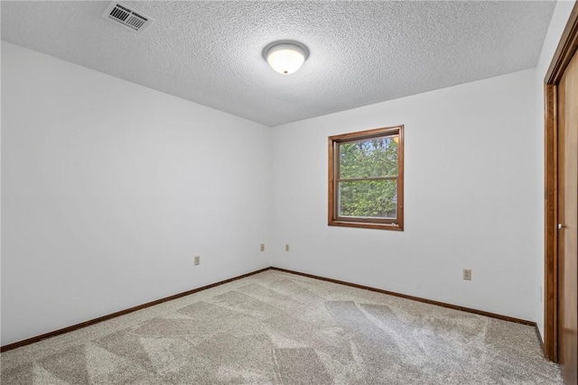 2176 Orchard Hill Rd, Siloam Springs, AR 72761 - spare room featuring carpet flooring and a textured ceiling