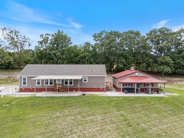 21018 Farm Rd Unit 2260, Eagle Rock, MO 65641 - back of house featuring a patio, a gazebo, and a yard