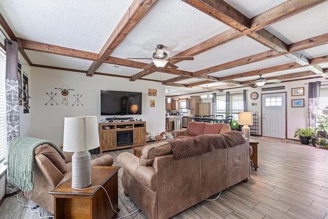 21018 Farm Rd Unit 2260, Eagle Rock, MO 65641 - living room featuring ceiling fan, coffered ceiling, beamed ceiling, light wood finished floors, and a textured ceiling