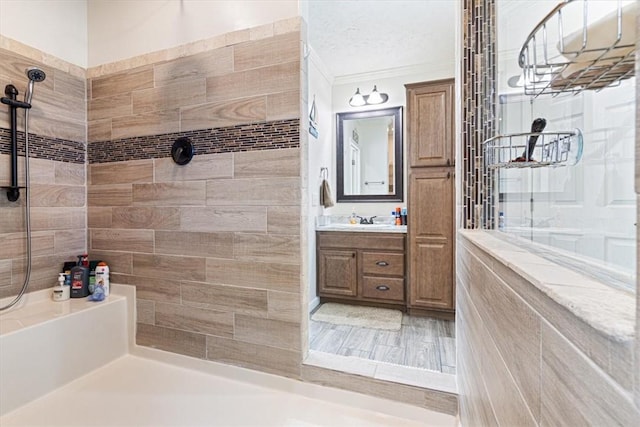 21018 Farm Rd Unit 2260, Eagle Rock, MO 65641 - full bath featuring a tile shower, vanity, crown molding, and a textured ceiling