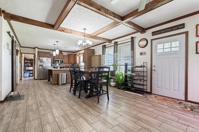 21018 Farm Rd Unit 2260, Eagle Rock, MO 65641 - dining area featuring wood finish floors, beamed ceiling, a chandelier, and a textured ceiling
