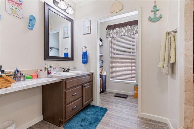 21018 Farm Rd Unit 2260, Eagle Rock, MO 65641 - full bath featuring vanity, ornamental molding, and wood finished floors
