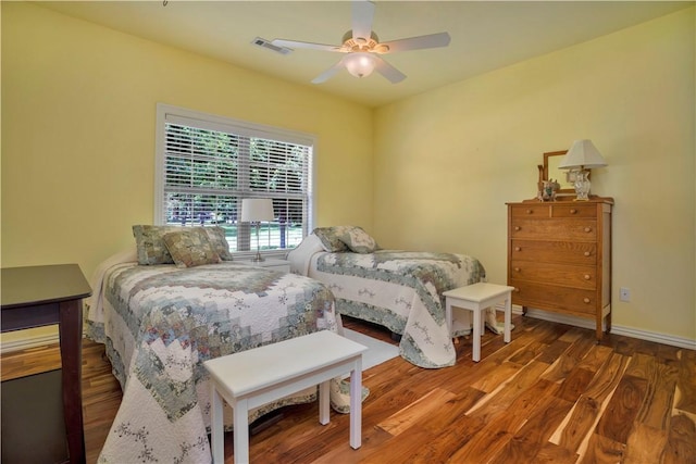 460 Viney Grove Rd, Prairie Grove, AR 72753 - bedroom featuring wood finished floors and ceiling fan