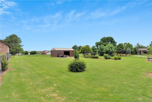 460 Viney Grove Rd, Prairie Grove, AR 72753 - view of yard with a pole building, an outbuilding, and a garage