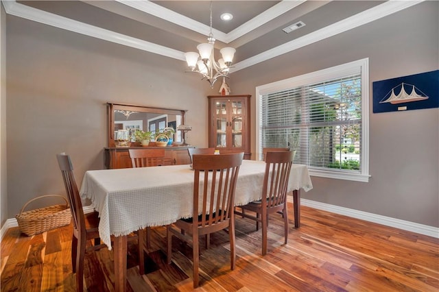 460 Viney Grove Rd, Prairie Grove, AR 72753 - dining space with a chandelier, ornamental molding, light wood-type flooring, a raised ceiling, and recessed lighting