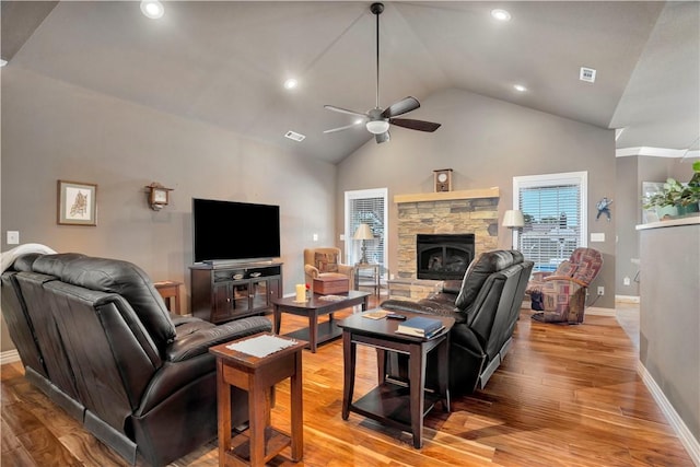 460 Viney Grove Rd, Prairie Grove, AR 72753 - living room with a ceiling fan, light wood-style floors, a stone fireplace, recessed lighting, and high vaulted ceiling
