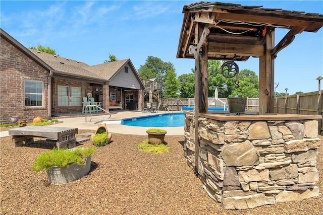 460 Viney Grove Rd, Prairie Grove, AR 72753 - view of swimming pool featuring a patio and a fenced backyard
