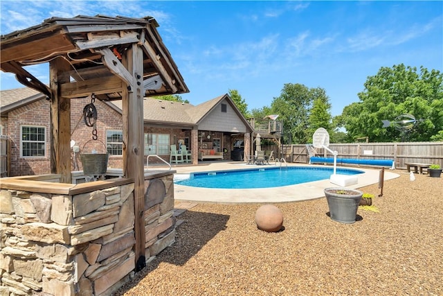 460 Viney Grove Rd, Prairie Grove, AR 72753 - view of swimming pool featuring a fenced backyard and a patio area