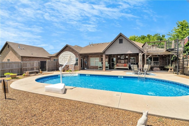 460 Viney Grove Rd, Prairie Grove, AR 72753 - view of swimming pool featuring a patio, stairway, and an outdoor hangout area