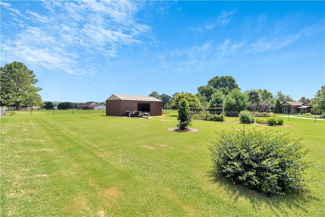 460 Viney Grove Rd, Prairie Grove, AR 72753 - view of grassy yard featuring a pole building, an outbuilding, and a detached garage