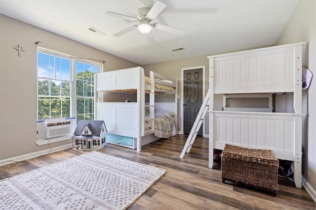 2042 Greasy Creek Ln, Washburn, MO 65772 - bedroom featuring cooling unit, wood finished floors, and a ceiling fan