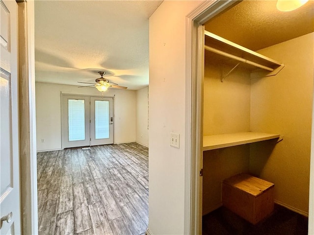 14076 Canal St, Rogers, AR 72758 - spacious closet featuring wood finished floors and ceiling fan