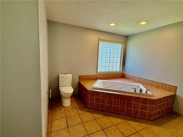 14076 Canal St, Rogers, AR 72758 - bathroom with a bath, tile patterned floors, and a textured ceiling