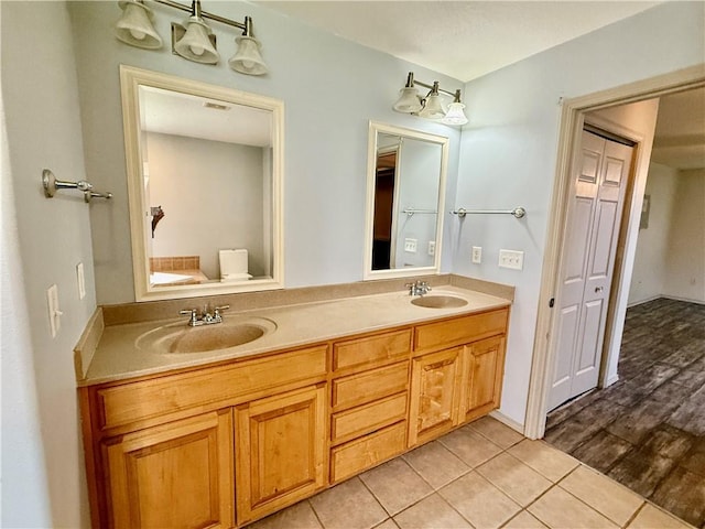 14076 Canal St, Rogers, AR 72758 - full bath featuring double vanity and tile patterned flooring