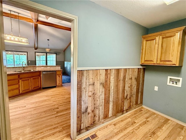 14076 Canal St, Rogers, AR 72758 - laundry room with washer hookup, light wood-type flooring, and cabinet space