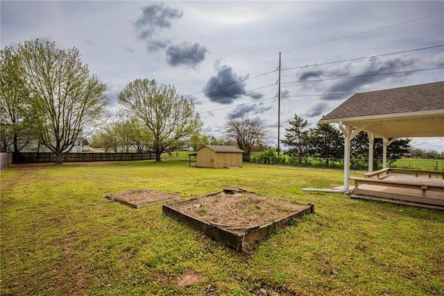 5315 Walden St, Lowell, AR 72745 - fenced backyard with a storage shed