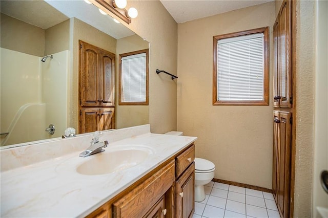 5315 Walden St, Lowell, AR 72745 - bathroom featuring vanity, a shower, and tile patterned flooring