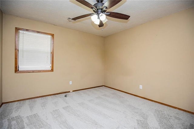 5315 Walden St, Lowell, AR 72745 - unfurnished room with light carpet, ceiling fan, and a textured ceiling