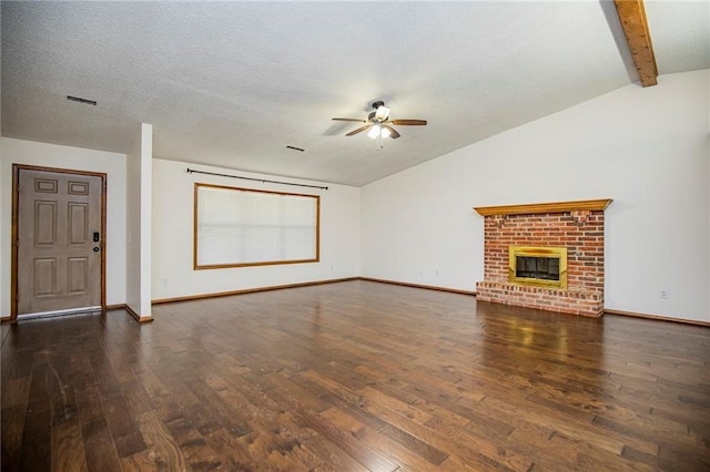 5315 Walden St, Lowell, AR 72745 - unfurnished living room with lofted ceiling, ceiling fan, wood finished floors, a fireplace, and a textured ceiling