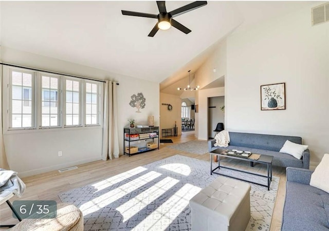 5 Horseshoe Dr, Holiday Island, AR 72631 - living room featuring ceiling fan, wood finished floors, and high vaulted ceiling