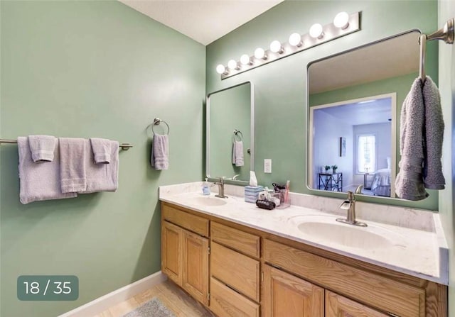 5 Horseshoe Dr, Holiday Island, AR 72631 - ensuite bathroom featuring double vanity and tile patterned floors