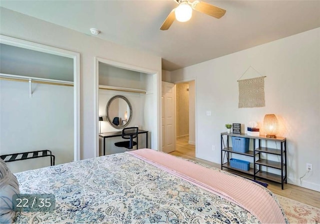5 Horseshoe Dr, Holiday Island, AR 72631 - bedroom featuring multiple closets, wood finished floors, and a ceiling fan