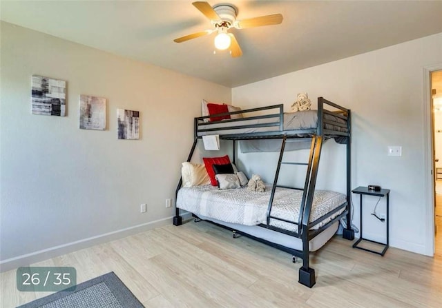 5 Horseshoe Dr, Holiday Island, AR 72631 - bedroom with light wood finished floors and ceiling fan