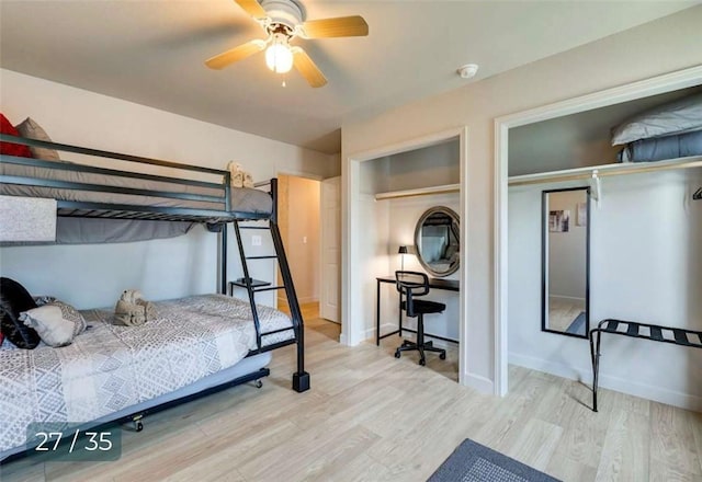 5 Horseshoe Dr, Holiday Island, AR 72631 - bedroom with wood finished floors, multiple closets, and ceiling fan