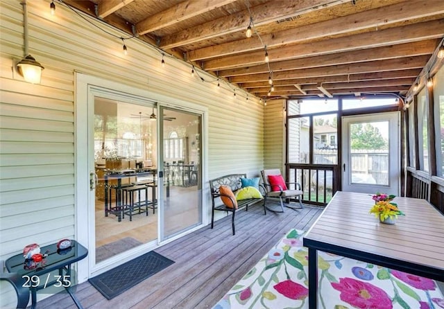 5 Horseshoe Dr, Holiday Island, AR 72631 - sunroom / solarium with beam ceiling, ceiling fan, and outdoor dining space