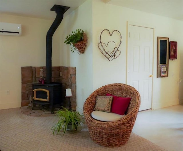1042 County Road 445, Berryville, AR 72616 - sitting room with a wall unit AC, a wood stove, and carpet
