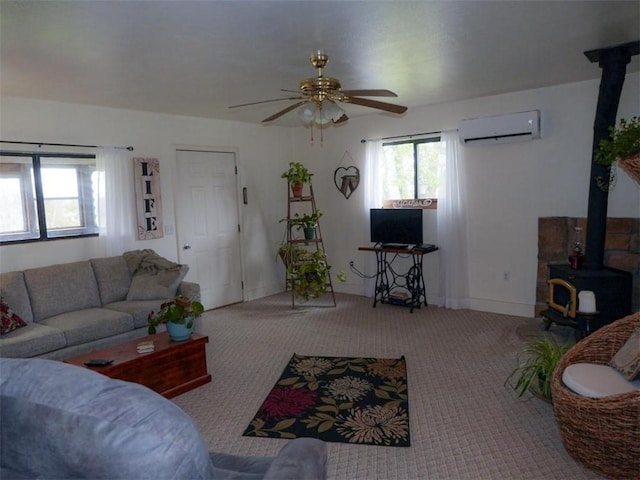 1042 County Road 445, Berryville, AR 72616 - living room featuring a wall mounted air conditioner, a wood stove, carpet floors, and ceiling fan