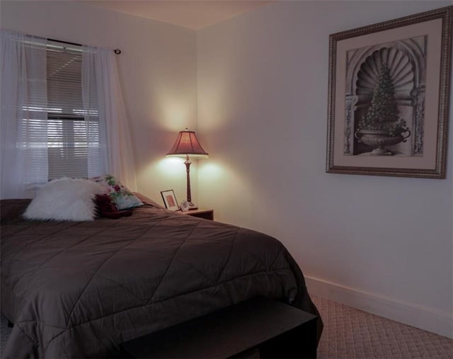 1042 County Road 445, Berryville, AR 72616 - carpeted bedroom featuring baseboards
