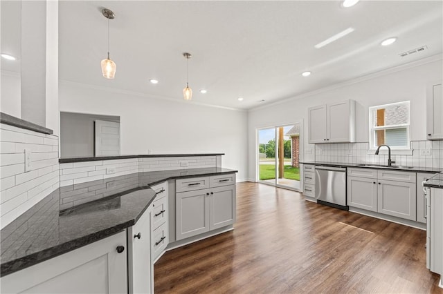 2 Wendike Ln, Bella Vista, AR 72715 - kitchen with dishwasher, crown molding, tasteful backsplash, pendant lighting, and dark wood finished floors