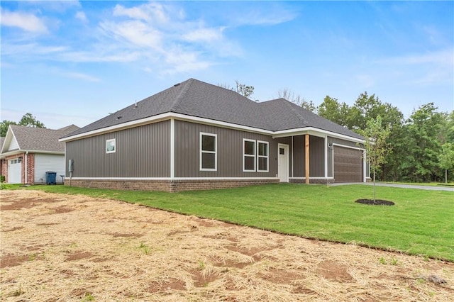 2 Wendike Ln, Bella Vista, AR 72715 - view of front facade with an attached garage, brick siding, and a front yard