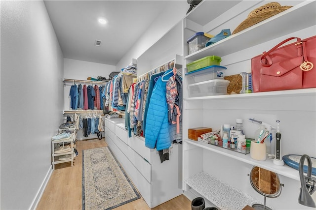 276 N Yona Ln, Farmington, AR 72730 - walk in closet with wood finished floors