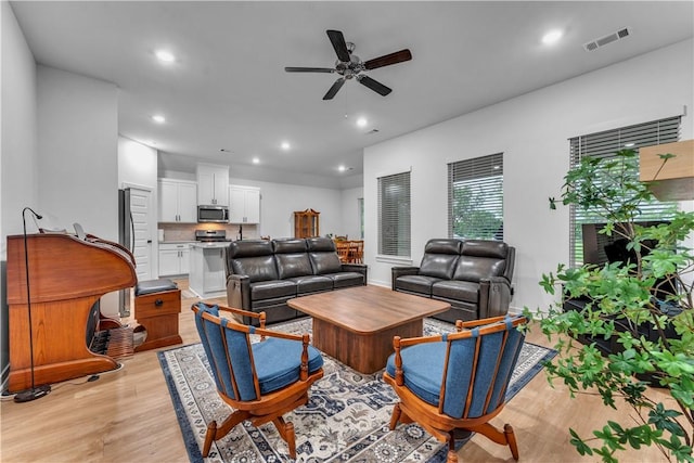276 N Yona Ln, Farmington, AR 72730 - living area with a ceiling fan, light wood-style floors, and recessed lighting