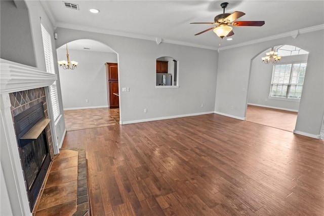 4788 Soapstone Dr, Fayetteville, AR 72704 - unfurnished living room with a fireplace, a chandelier, ceiling fan, wood finished floors, and recessed lighting