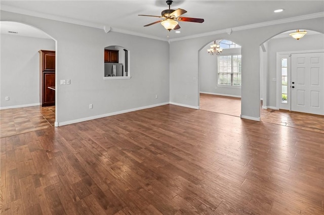 4788 Soapstone Dr, Fayetteville, AR 72704 - unfurnished living room with ceiling fan, dark wood-style flooring, crown molding, a chandelier, and arched walkways