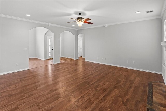 4788 Soapstone Dr, Fayetteville, AR 72704 - empty room featuring a ceiling fan, arched walkways, recessed lighting, wood finished floors, and crown molding
