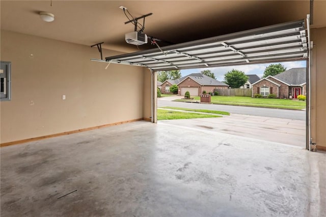 4788 Soapstone Dr, Fayetteville, AR 72704 - garage with a garage door opener, a residential view, and electric panel