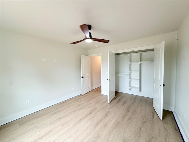 1215 John Renfro Rd, Pea Ridge, AR 72751 - unfurnished bedroom featuring light wood-style floors, a closet, and ceiling fan