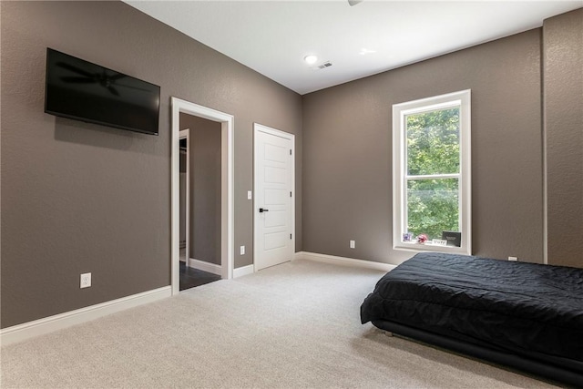 8 Mckenzie Way, Bella Vista, AR 72715 - carpeted bedroom featuring baseboards