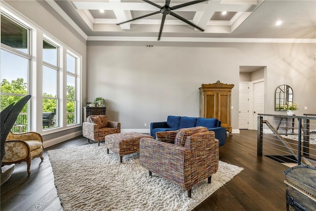 8 Mckenzie Way, Bella Vista, AR 72715 - living area featuring coffered ceiling, plenty of natural light, ornamental molding, dark wood-style flooring, and ceiling fan