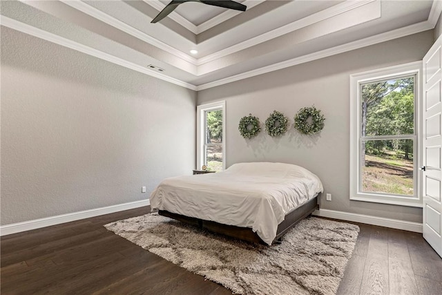 8 Mckenzie Way, Bella Vista, AR 72715 - bedroom featuring multiple windows, dark wood finished floors, ornamental molding, a raised ceiling, and recessed lighting