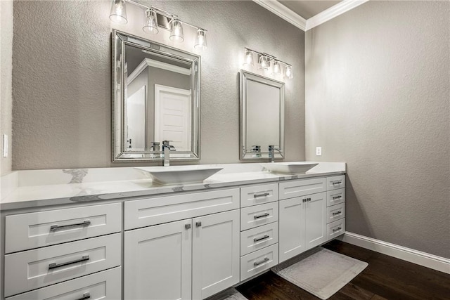 8 Mckenzie Way, Bella Vista, AR 72715 - full bathroom featuring crown molding, a textured wall, double vanity, and wood finished floors